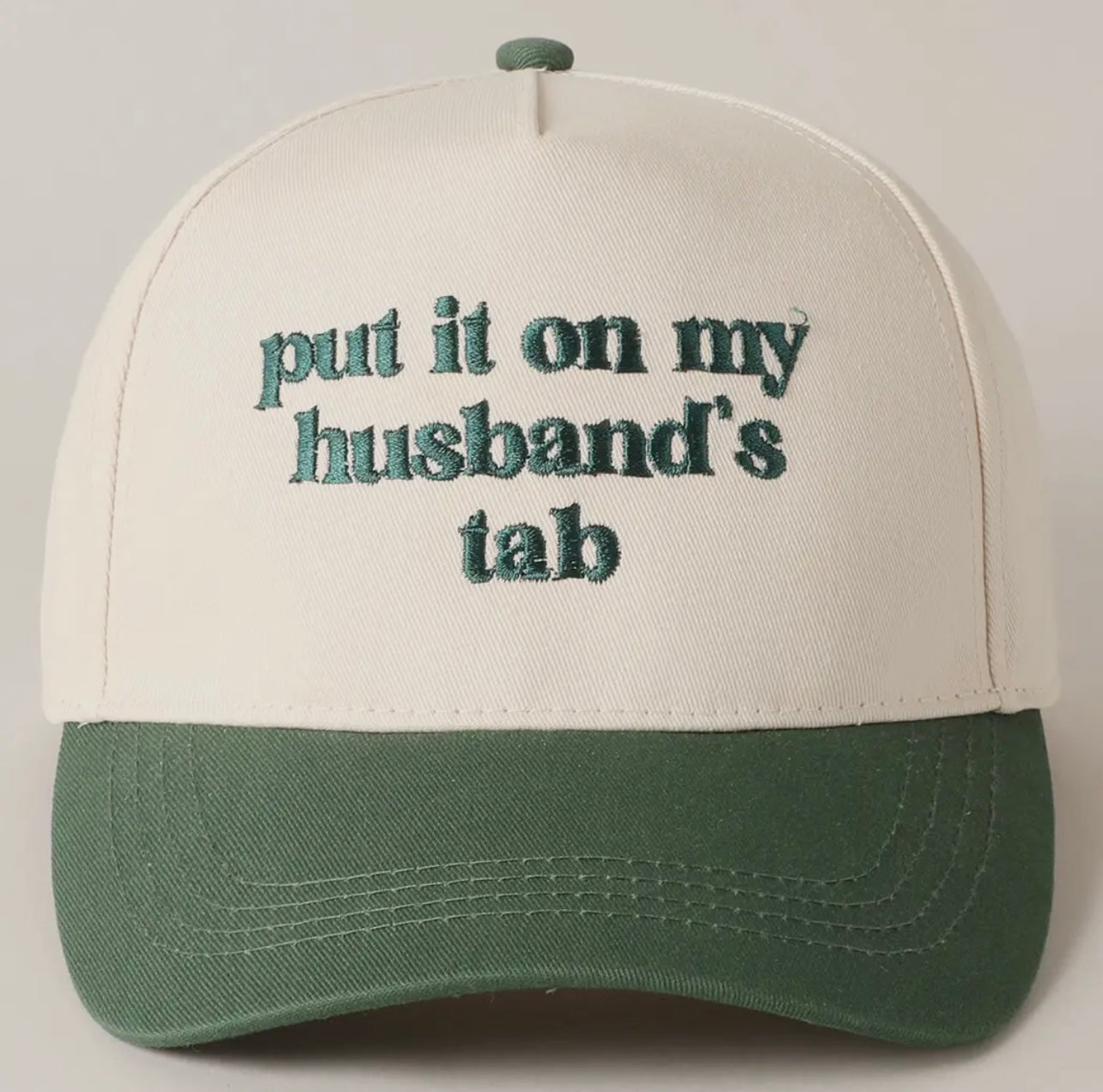 Put it on my Husbands Tab Trucker Hat