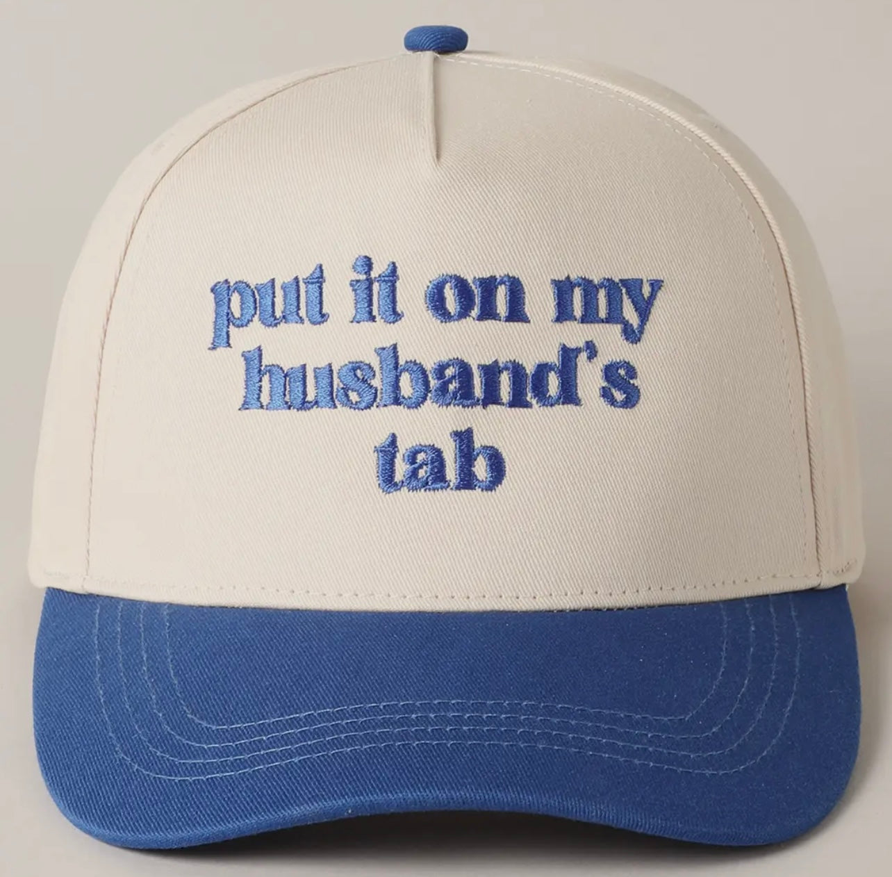 Put it on my Husbands Tab Trucker Hat