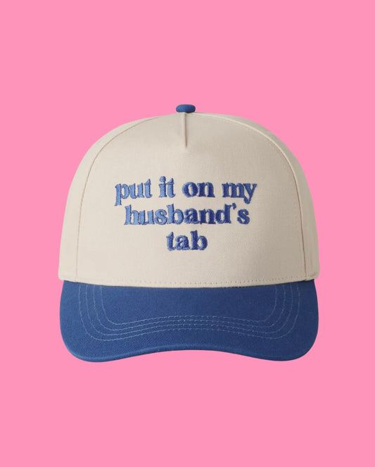 Put it on my Husbands Tab Trucker Hat